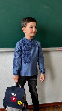 Boy&rsquo;s embroidered shirt &ldquo;Asymmetry&rdquo; in denim color with blue embroidery