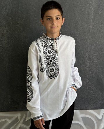 Boy&rsquo;s embroidered shirt &ldquo;Asymmetry&rdquo; in white with black embroidery